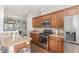 Well-equipped kitchen boasts stainless steel appliances, gas range, and ample counter space at 100 Stratford Lakes # 130, Durham, NC 27713