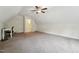 Large bonus room featuring a white ceiling, neutral walls, and plenty of carpeted floor space at 105 Old Barn Way, Wendell, NC 27591