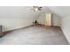 Expansive bonus room with a ceiling fan that can be used for a variety of purposes at 105 Old Barn Way, Wendell, NC 27591