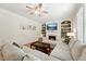Cozy living room with a fireplace and comfortable sectional seating at 105 Old Barn Way, Wendell, NC 27591