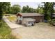 A beautiful shot of the back of the home featuring a walkout basement and an expansive backyard area at 112 S Joyland St, Durham, NC 27703