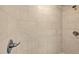 Close up of a tiled shower with modern fixtures at 112 S Joyland St, Durham, NC 27703