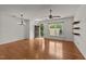 Bright living area features hardwood floors, neutral walls, and a window at 1120 Renewal Pl # 111, Raleigh, NC 27603