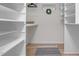 Walk-in closet provides ample storage space with built-in shelves and organizers at 1134 Deerfoot Trail Trl, Sanford, NC 27332