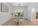 Charming dining room with natural light and traditional-style furniture at 1134 Deerfoot Trail Trl, Sanford, NC 27332