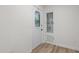 Bright hallway features a decorative glass door and a built-in display cabinet at 1134 Deerfoot Trail Trl, Sanford, NC 27332