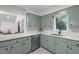 Kitchen with shaker style cabinetry, stainless steel appliances, and white countertop at 1134 Deerfoot Trail Trl, Sanford, NC 27332