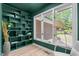 Inviting living room features custom built-ins and large windows providing ample natural light at 1134 Deerfoot Trail Trl, Sanford, NC 27332