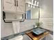 Bathroom with a unique light blue vessel sink and subway tile backsplash at 121 Chimney Rise Dr, Cary, NC 27511
