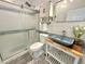 Bathroom with stylish vessel sink, subway tile, and glass enclosed shower stall at 121 Chimney Rise Dr, Cary, NC 27511