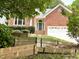 Lovely brick home with well-maintained landscaping and a two-car garage at 121 Chimney Rise Dr, Cary, NC 27511