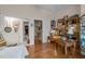 Bedroom featuring hardwood floors and a view to adjacent rooms at 12221 Orchardgrass Ln, Raleigh, NC 27614