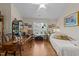 Bedroom featuring hardwood floors, a large desk, and natural light at 12221 Orchardgrass Ln, Raleigh, NC 27614