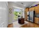 Sunny dining area featuring lots of light and ample kitchen storage at 12221 Orchardgrass Ln, Raleigh, NC 27614