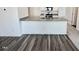 Beautiful kitchen with granite countertops, stainless steel appliances and wood floors at 124 N Keatts Winner Ct, Wilson's Mills, NC 27520