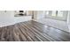Open-concept living area with wood flooring and easy access to the kitchen at 124 N Keatts Winner Ct, Wilson's Mills, NC 27520