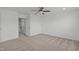 A bedroom with a ceiling fan and neutral carpeting at 127 Bowerbank Ln, Apex, NC 27539