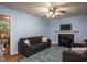 Inviting living room with a cozy fireplace, comfortable seating, and stylish decor creating a warm atmosphere at 129 Clark Ct, Youngsville, NC 27596