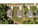 Aerial view of residential neighborhood showcasing well-maintained homes with spacious lawns and mature trees at 159 Clear Water Rd, Louisburg, NC 27549