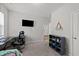 Carpeted bedroom with a TV and a desk is great for working from home at 159 Clear Water Rd, Louisburg, NC 27549