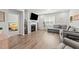 Cozy living room featuring a fireplace, neutral decor, and lots of natural light at 159 Clear Water Rd, Louisburg, NC 27549