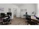 Office space with dual monitors and a view into the hallway is great for working from home at 159 Clear Water Rd, Louisburg, NC 27549
