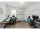 Office space is well lit by a window and features two desks with office chairs at 159 Clear Water Rd, Louisburg, NC 27549