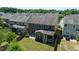 Home with a spacious backyard, screened porch, patio, and proximity to neighboring houses in a residential area at 1600 Drift Falls Ln, Wendell, NC 27591