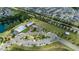 Overhead shot of the community's amenities, including a pool, clubhouse, park, and parking areas at 1600 Drift Falls Ln, Wendell, NC 27591