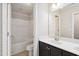 Bathroom with white tub and shower combination, offering functionality and style at 1600 Drift Falls Ln, Wendell, NC 27591