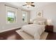 Charming bedroom with hardwood floors, natural light, and stylish decor at 1600 Drift Falls Ln, Wendell, NC 27591