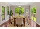 Cozy breakfast nook with large windows providing ample natural light and backyard views at 1600 Drift Falls Ln, Wendell, NC 27591