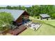 Stunning clubhouse with outdoor seating areas and lush landscaping, perfect for gatherings at 1600 Drift Falls Ln, Wendell, NC 27591
