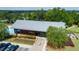 Community center with a modern design, pool, and well-manicured landscaping, enhancing community appeal at 1600 Drift Falls Ln, Wendell, NC 27591