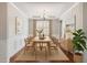 Bright dining room featuring modern decor, stylish furniture, and natural light at 1600 Drift Falls Ln, Wendell, NC 27591