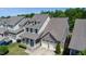 Inviting two-story home featuring a charming front porch and an attached two-car garage at 1600 Drift Falls Ln, Wendell, NC 27591