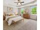 Inviting main bedroom with tray ceilings, neutral decor, and ample natural light at 1600 Drift Falls Ln, Wendell, NC 27591