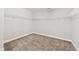 Spacious walk-in closet featuring wire shelving and neutral carpeting at 1600 Drift Falls Ln, Wendell, NC 27591