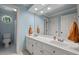 Bathroom with double sinks and granite counters at 18 Acornridge Ct, Durham, NC 27707