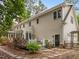 Exterior view showcasing the deck and backyard, seamlessly blending indoor and outdoor living spaces at 18 Acornridge Ct, Durham, NC 27707