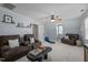 Spacious living room features comfortable seating and natural light at 18 Acornridge Ct, Durham, NC 27707