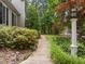 Inviting walkway with a classic lantern on a well landscaped lawn at 18 Acornridge Ct, Durham, NC 27707