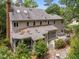 A house with a screened in porch and skylights at the rear at 18 Acornridge Ct, Durham, NC 27707