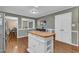 Open Kitchen featuring a center island with seating and stainless steel appliances at 1920 Hillock Dr, Raleigh, NC 27612