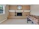 Spacious living room area features a fireplace and a foosball table for hours of entertainment at 1920 Hillock Dr, Raleigh, NC 27612