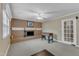 Open living room showcases a brick fireplace and a foosball table at 1920 Hillock Dr, Raleigh, NC 27612