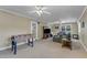 Large living room offers a recreational area, fireplace, and comfortable couches at 1920 Hillock Dr, Raleigh, NC 27612