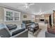 Inviting living room features a comfortable couch, fireplace, and a game table at 1920 Hillock Dr, Raleigh, NC 27612