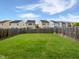 A verdant backyard is fenced for privacy and provides a lovely outdoor space at 2072 Tanners Mill Dr, Durham, NC 27703