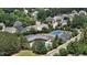 Community featuring lush landscaping, tennis court, community pool, and roadways at 2077 Amalfi Pl, Apex, NC 27502